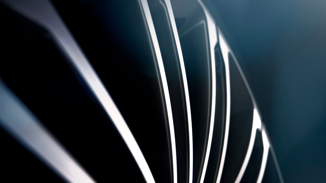 Details of the rails of a wheel on a dark background