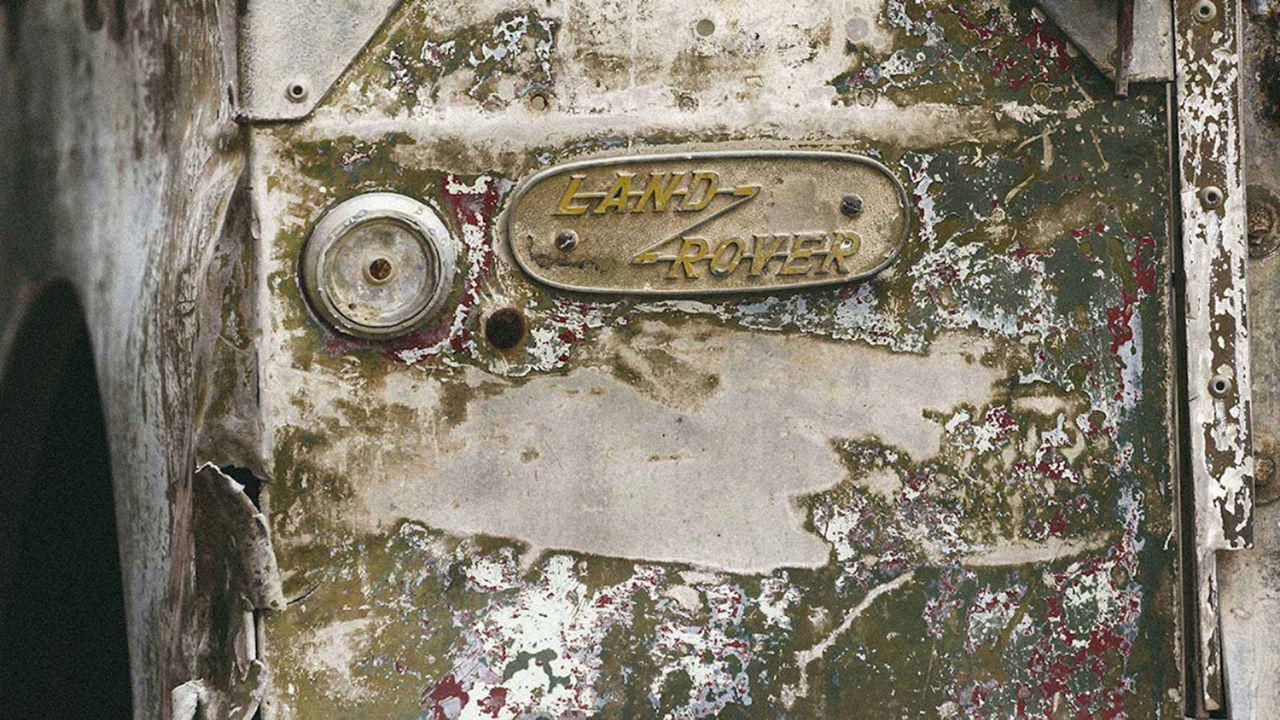 Close up of old Land Rover badge