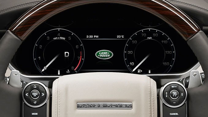 Close up of Range Rover steering wheel and dashboard