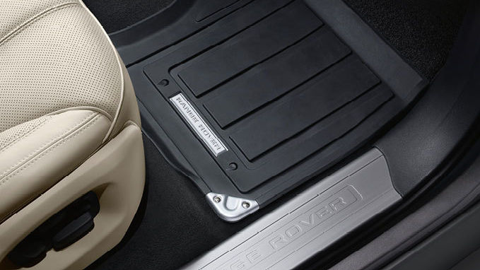 Close up of Range Rover side step and passenger seat