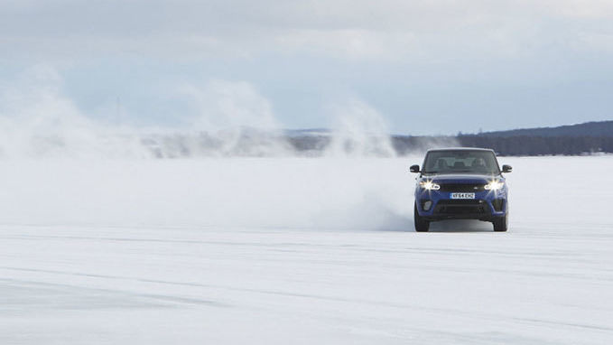 Range Rover Sport SVR driving through snowy landscape