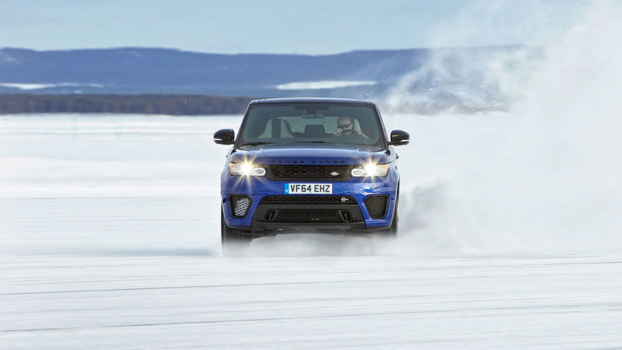 Range Rover Sport SVR driving through snowy landscape