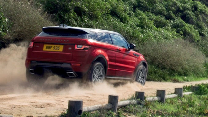 Range Rover Evoque driving on dirt road