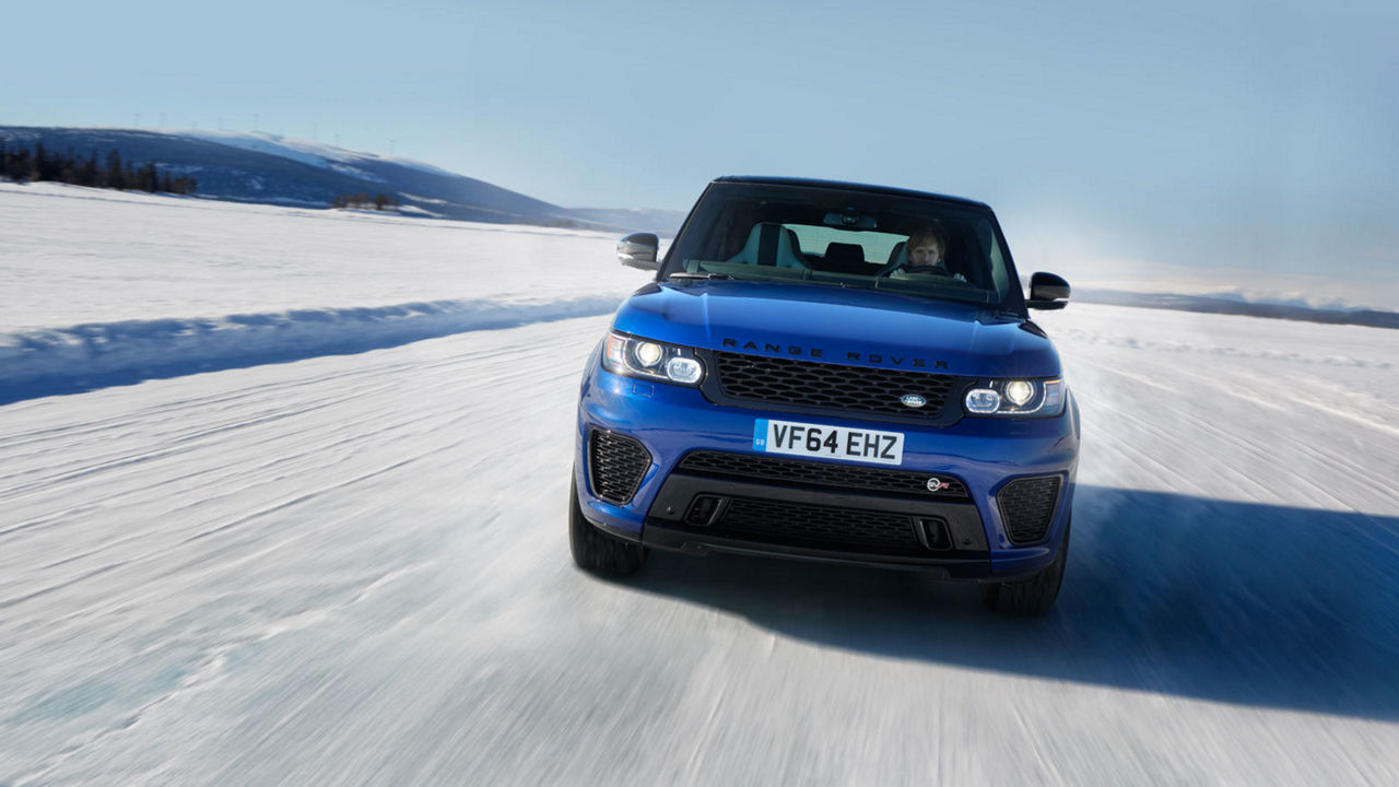 Range Rover Sport SVR driving through snowy landscape