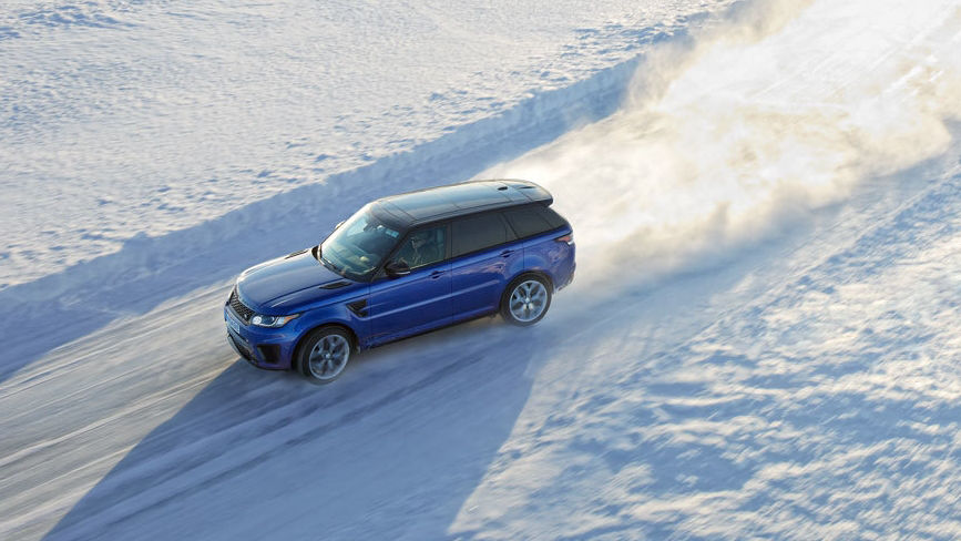 Range Rover Sport SVR driving through snowy landscape