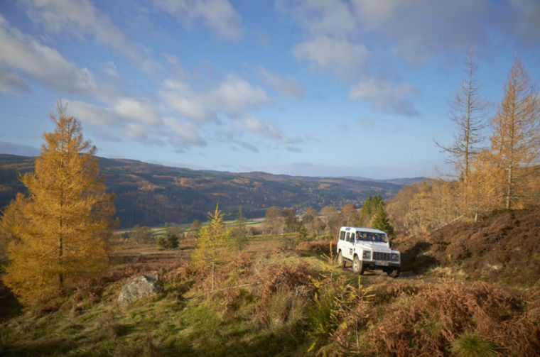 Defender moving  mountain hill on off-road