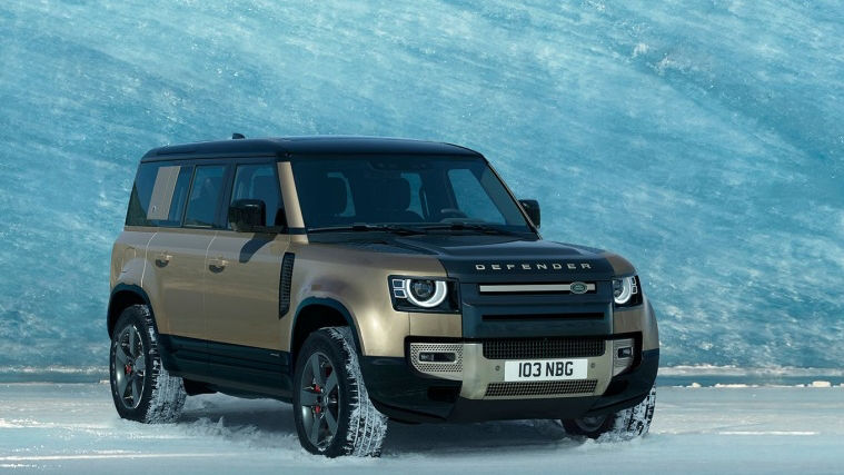 Land Rover Defender parked on snow