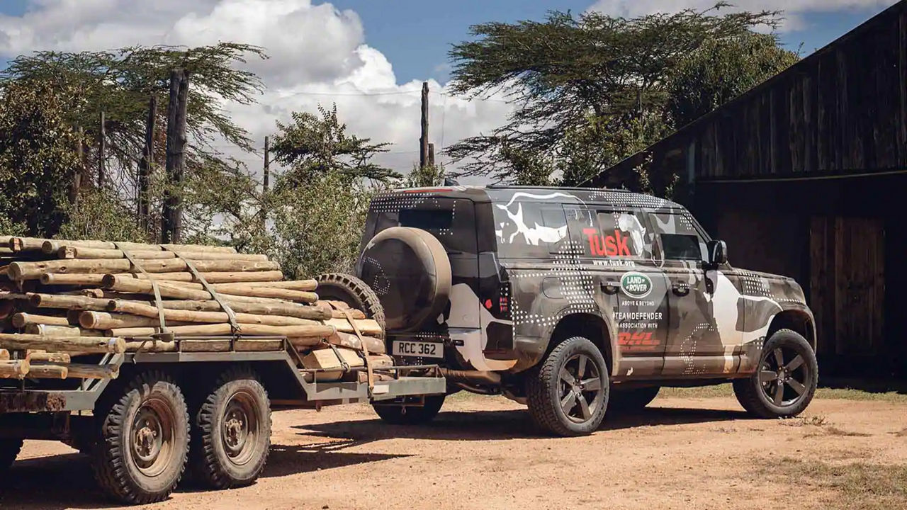 Defender towing logs