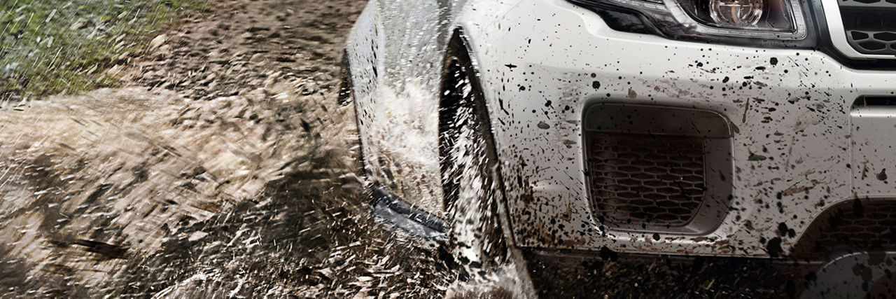 Range Rover Evoque driving in mud