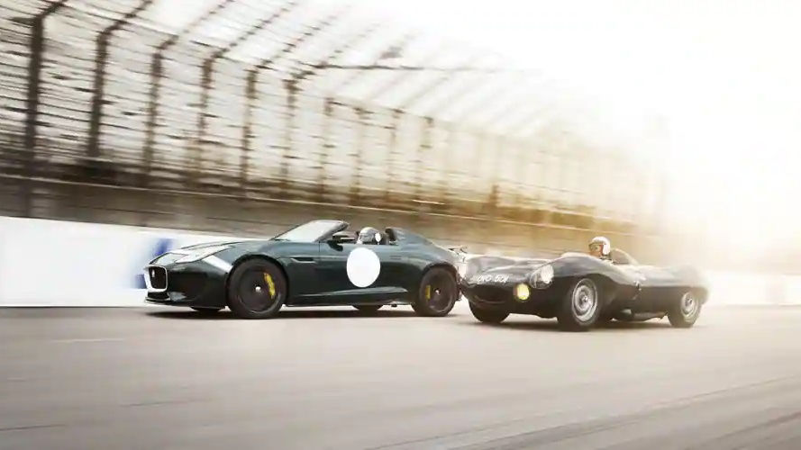 Classic Jaguar cars on a racing track