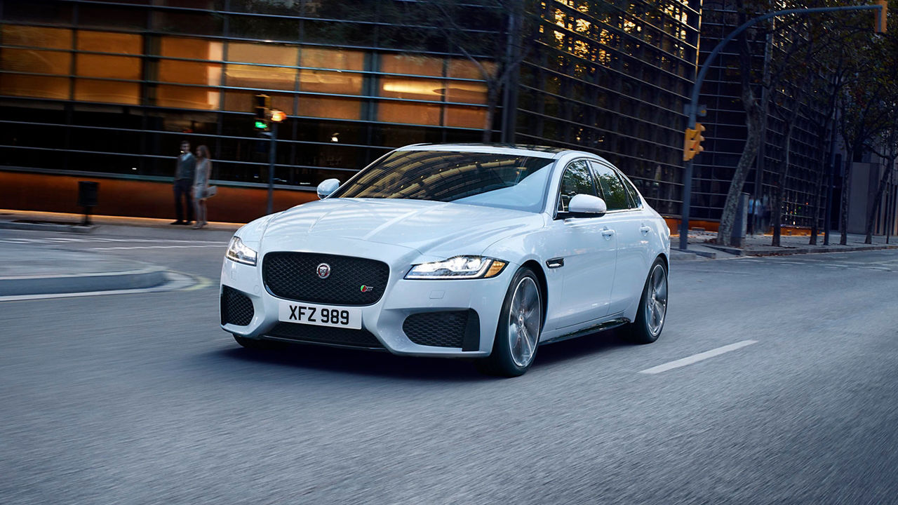 Jaguar XF running on city road