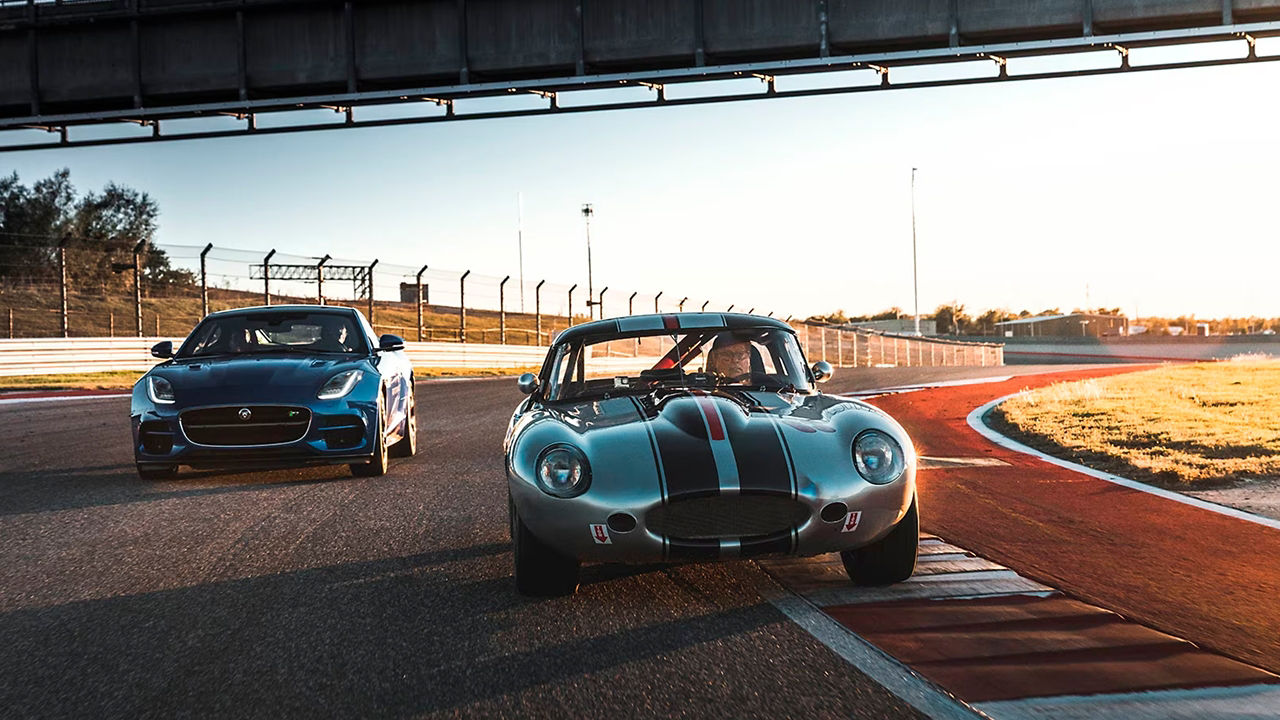 Jaguar E-Type running on racing track