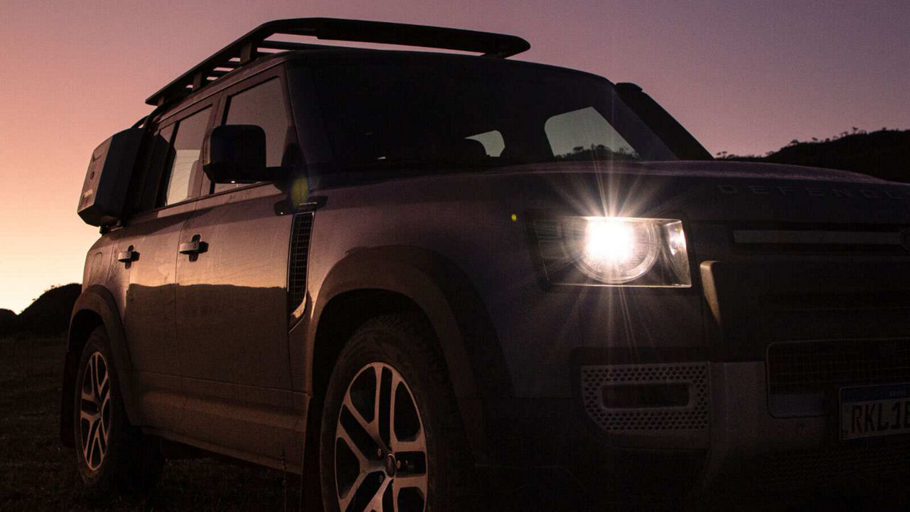 Close up of Defender with its headlights on