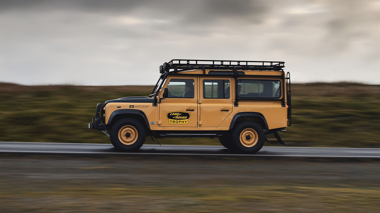 Land Rover Defender Works V8 Trophy driving on road