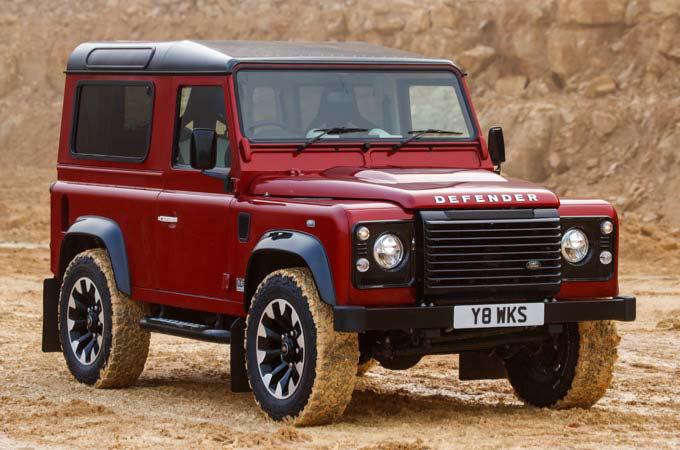 Land Rover Defender Works V8 parked on mud