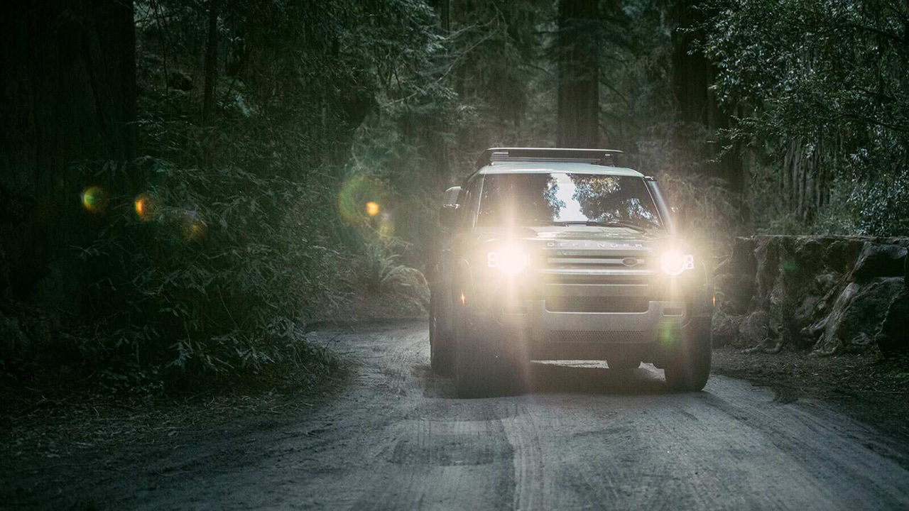 John Mayer Land Rover Defender in forest