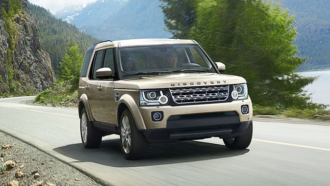 Land Rover Discovery driving on mountain road