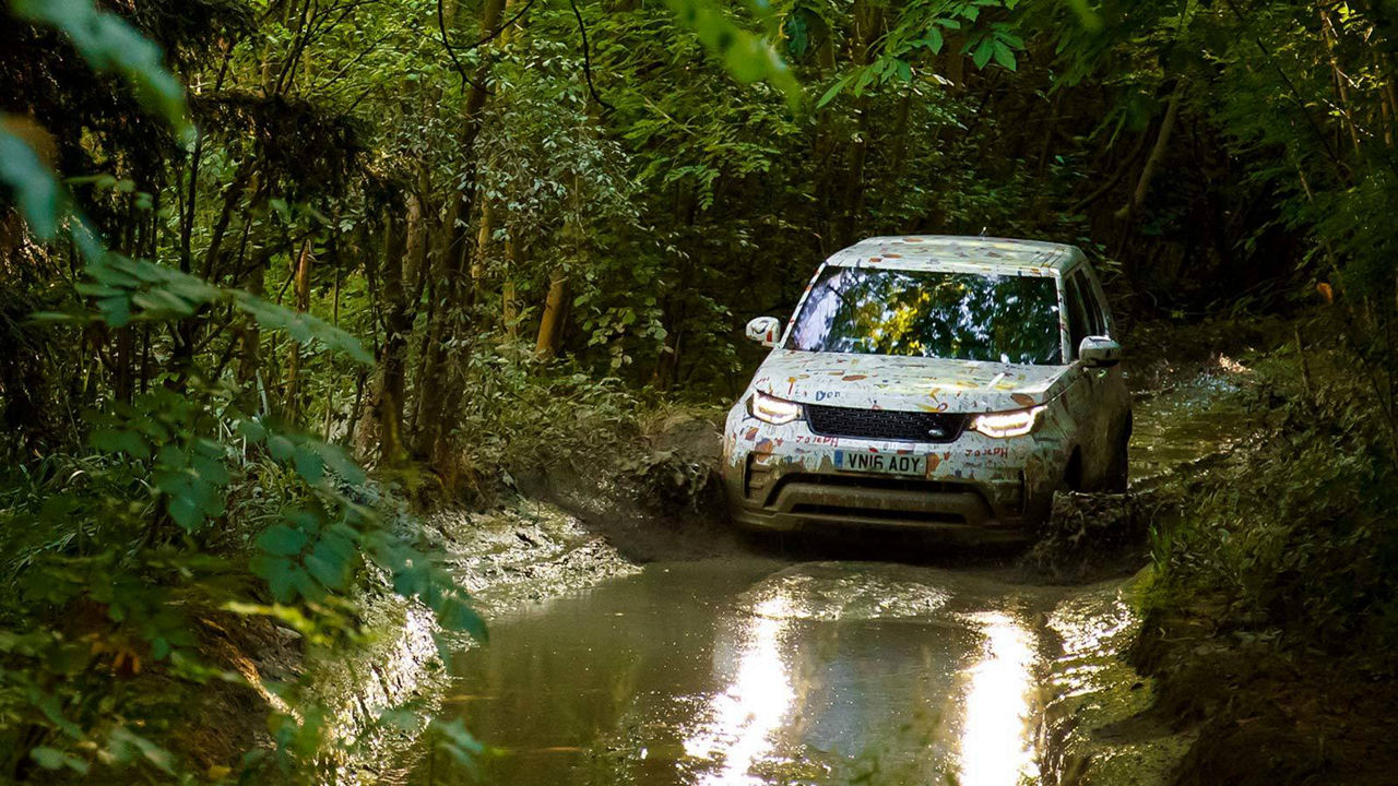 Discovery with Disco Kids Camo driving in a jungle