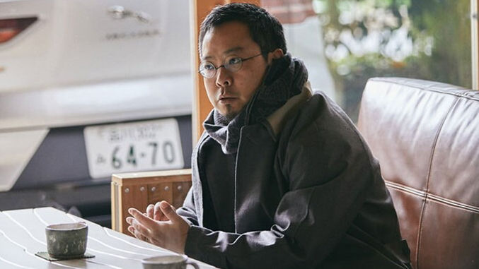 Man sitting in table with tea cups