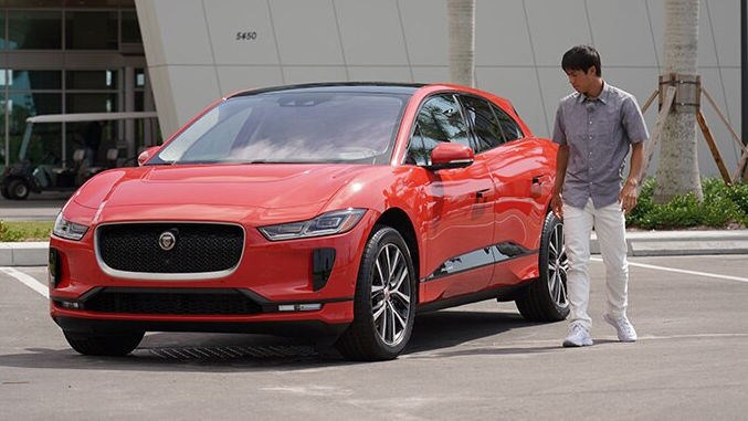 Man standing in-front JAGUAR