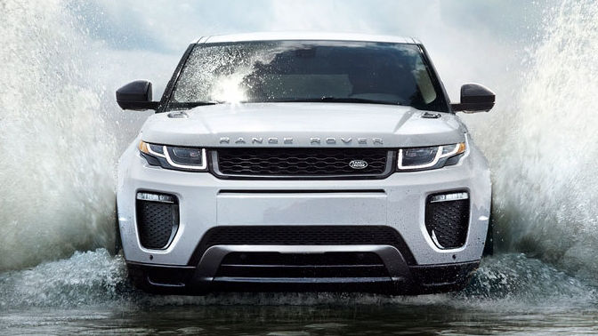 Range Rover driving through water