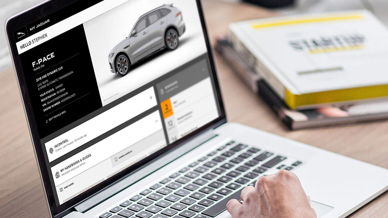 Jaguar retailer page on laptop 