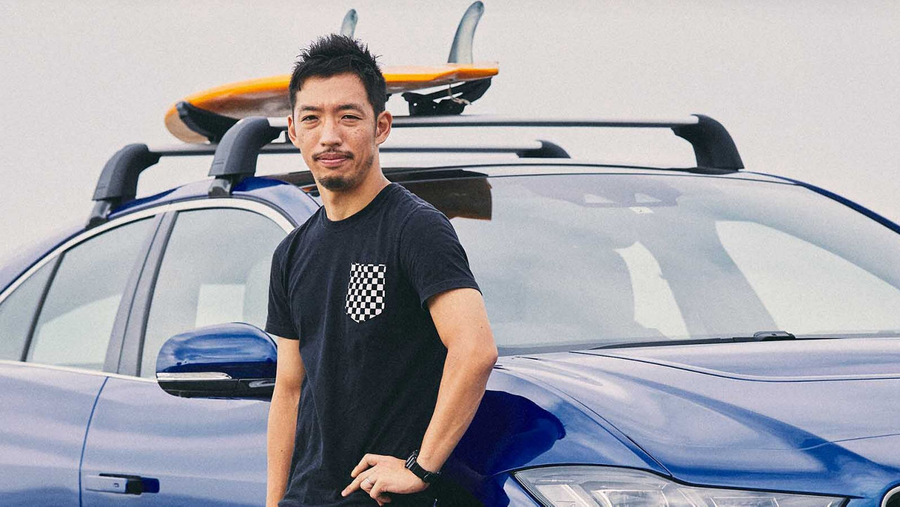 Ryosuke Nishida in front of a Jaguar I-Pace