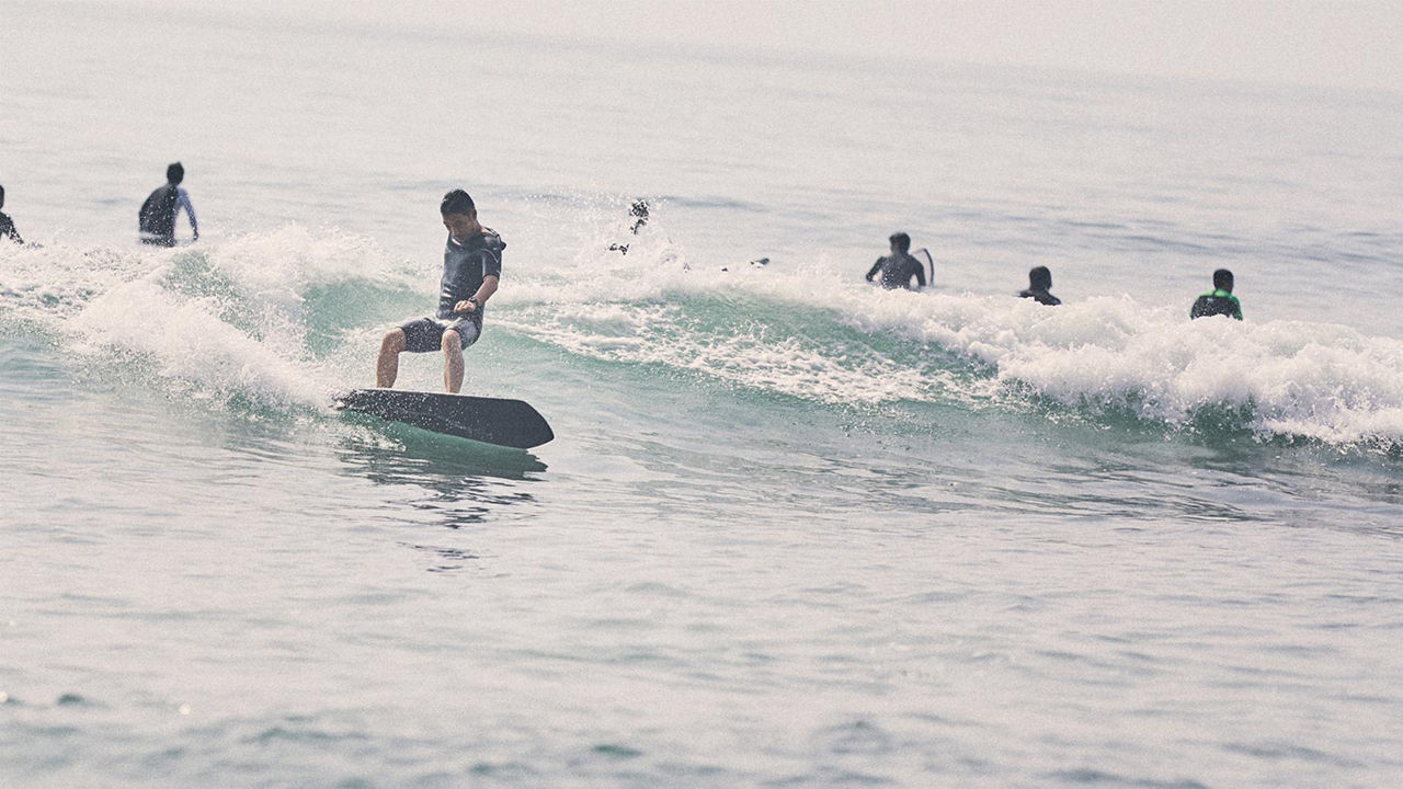 Ryosuke Nishida is surfing