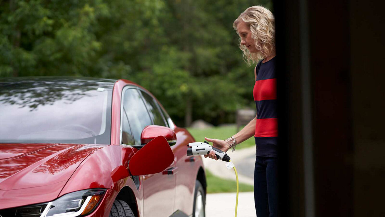 Donna charging her I-Pace