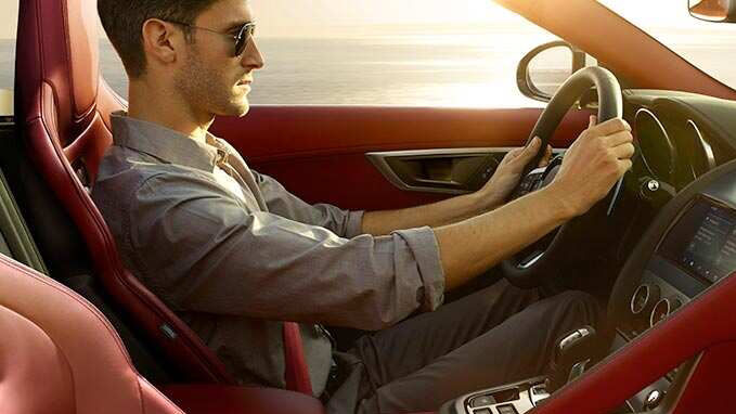 Man driving F-Type