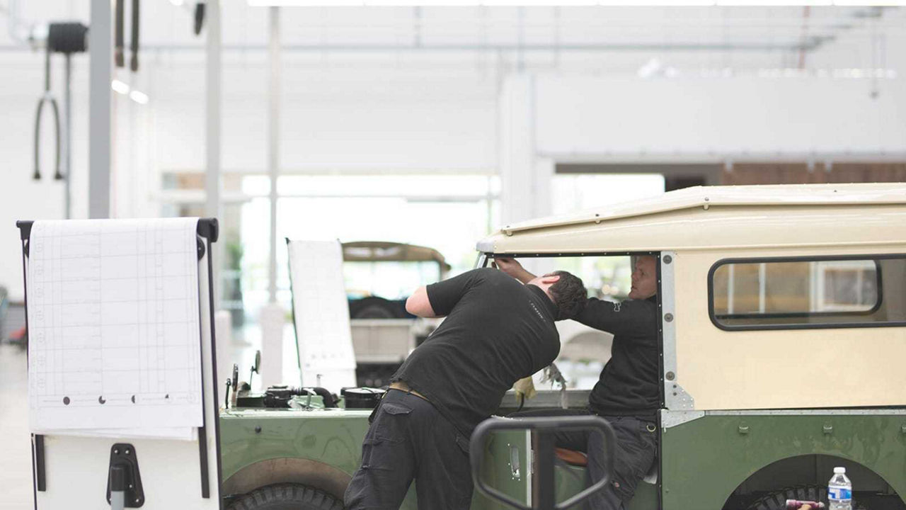 Classic Land Rover being worked on in factory