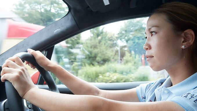 Momoko Ueda driving her Jaguar I-Pace