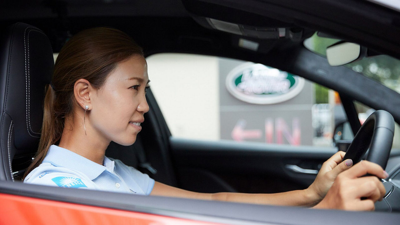 Momoko Ueda driving her Jaguar I-Pace