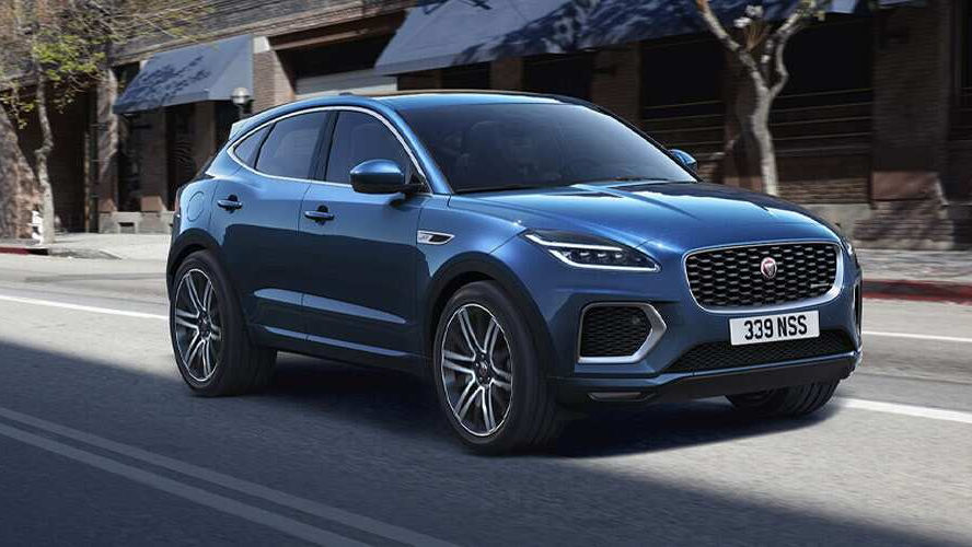 Jaguar vehicle driving down road