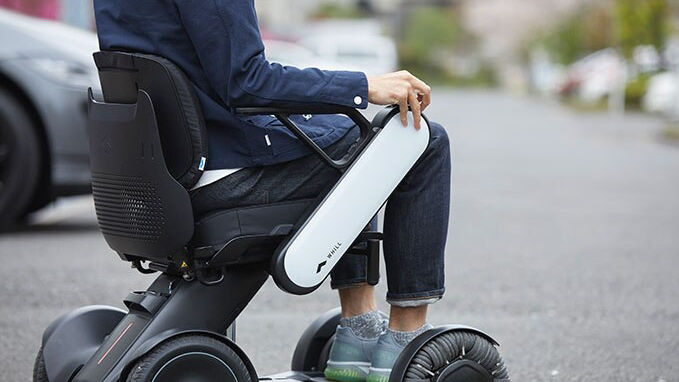 a man riding a wheelchair