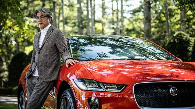 Tatsuya Kushima in front of a Jaguar I-Pace