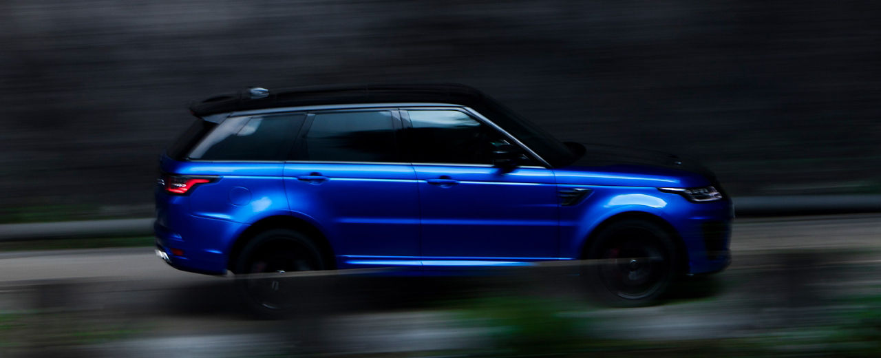 Range Rover Sport Driving On Mountain Runway Road