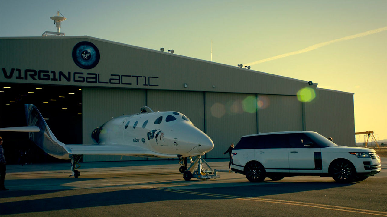 Land Rover Range Rover carrying Cargo Plane from Airport Depo