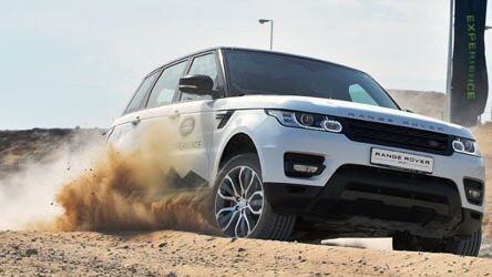 Range Rover driving in sand