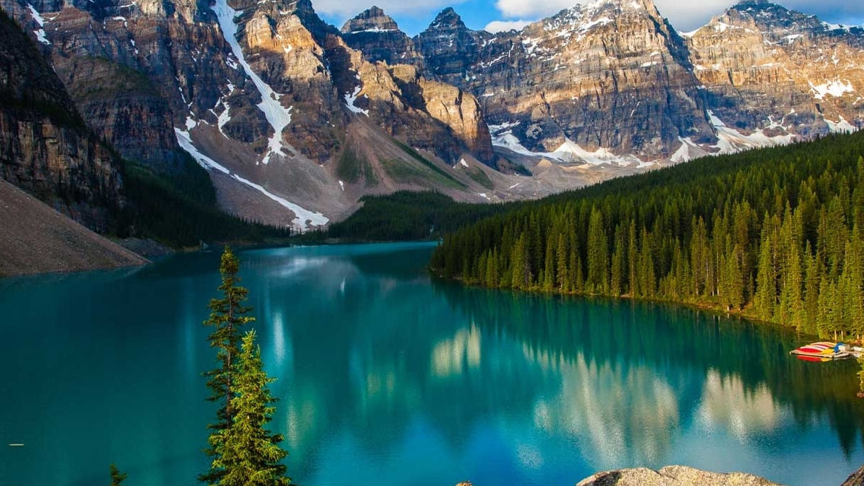 A lake at the base of a mountain range