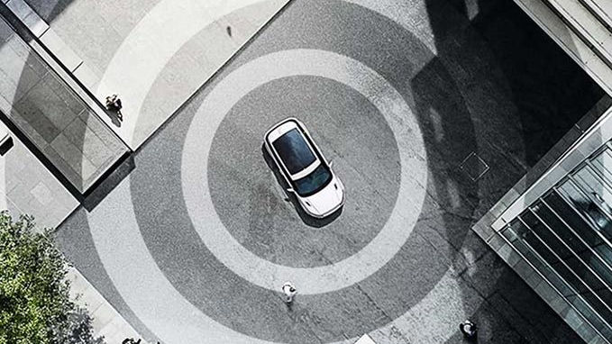 top view from distance of a land rover vehicle in white