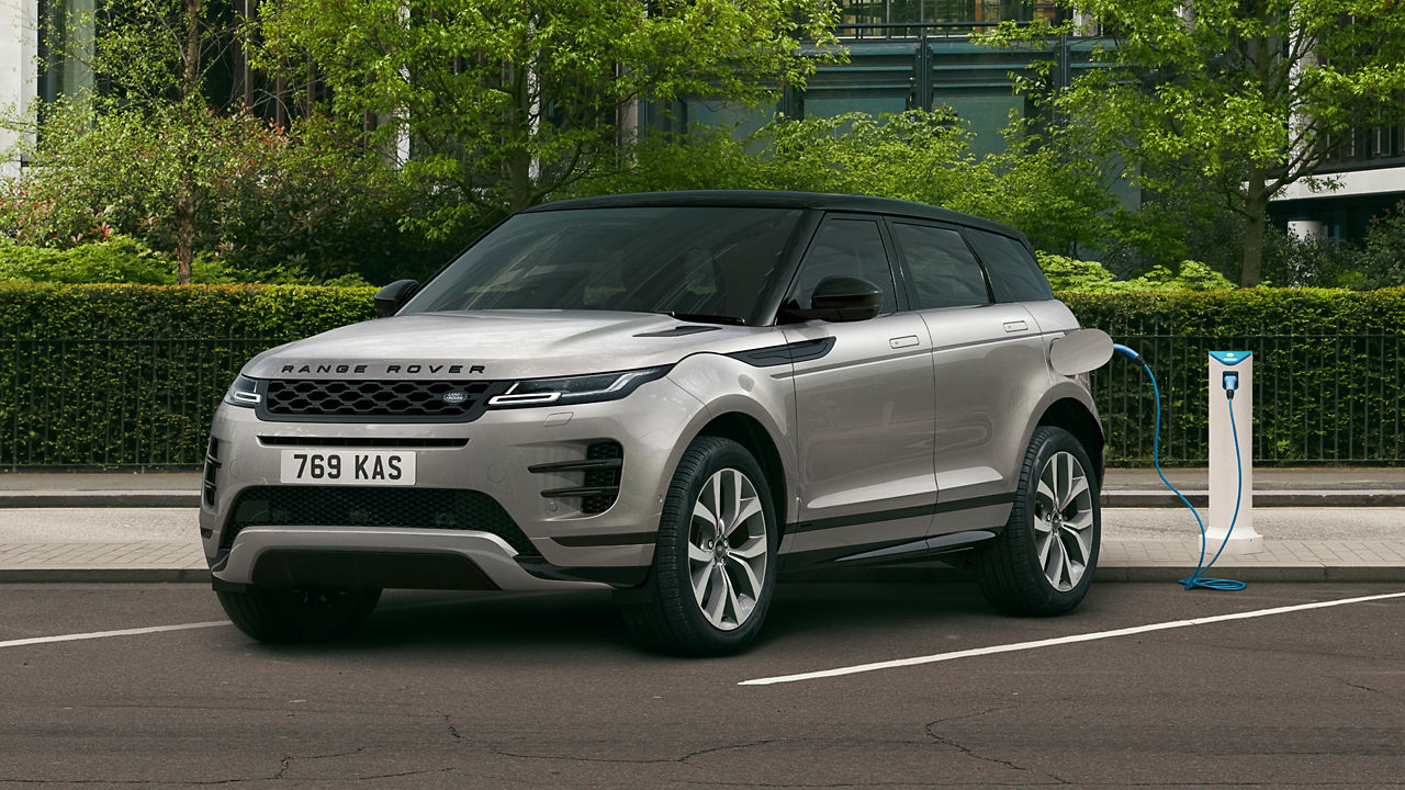 Range Rover Connected And Charging At Supercharger Station