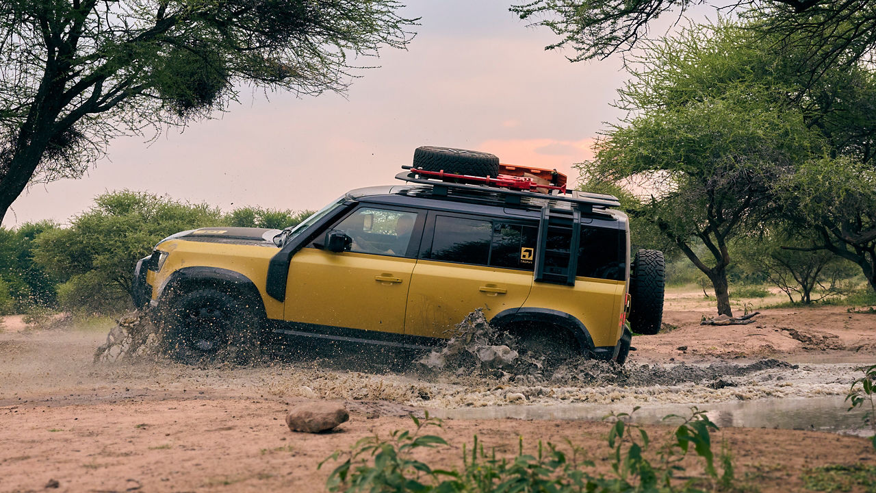 Defender Trophy on muddy road