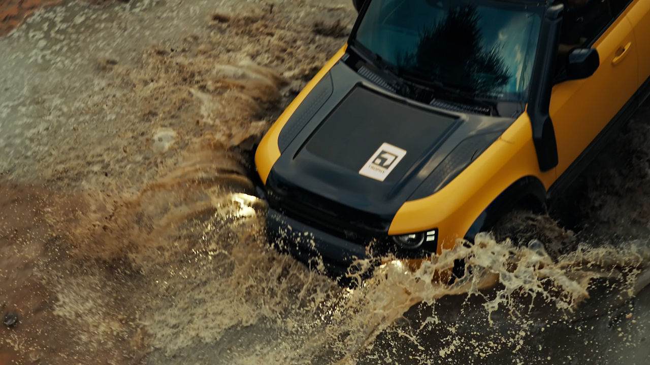 Defender Trophy driving in water