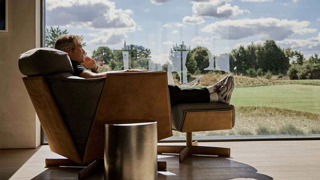 Man overlooking the view from the Window