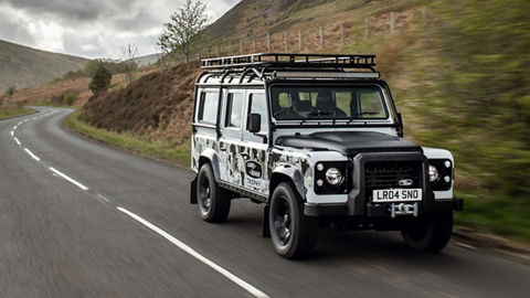 Defender Classic driving along a country road