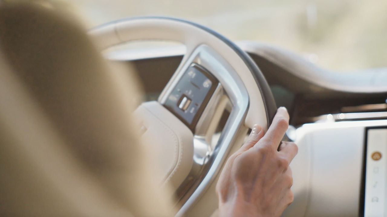 A person driving a car
