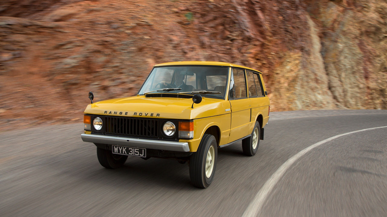 Range Rover Old Model Riding on Road