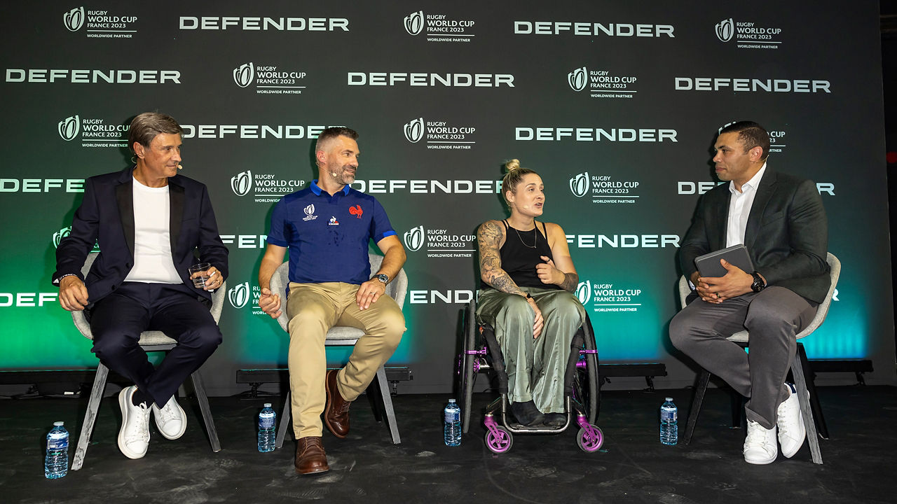 RWC Defender player on stage