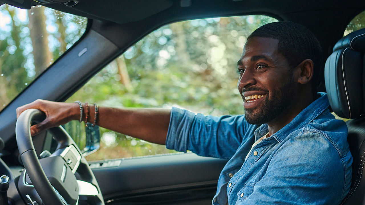 Man sitting on the Driver's Seat